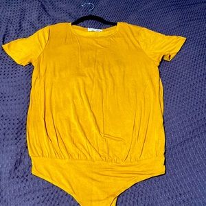 Mustard yellow body suite size M